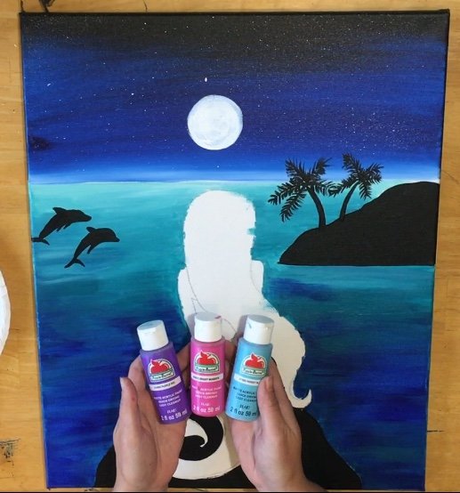 Step by step painting picture instructions. How to paint a mermaid. This night time seascape painting has dolphins, palm trees, a heart constellation, a full moon and sparking turquoise Caribbean water. FREE traceable and video included! 